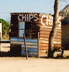 In the village, a makeshift kiosk where you can buy potatoe crisps, sweets and light grocery items
